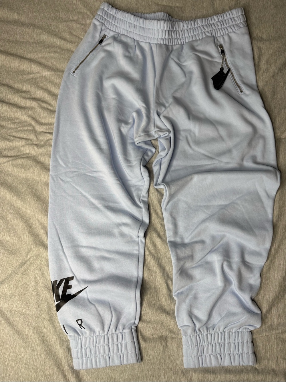 Nike Women’s Light Blue Joggers with Black Logo